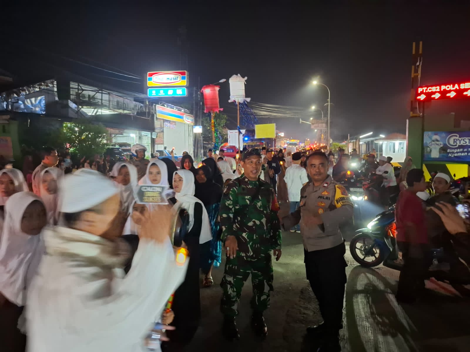 Polsek Caringin Laksanakan Pengamanan Pengawalan dan Pengaturan Lalin Saat Pawai Obor 1447 H