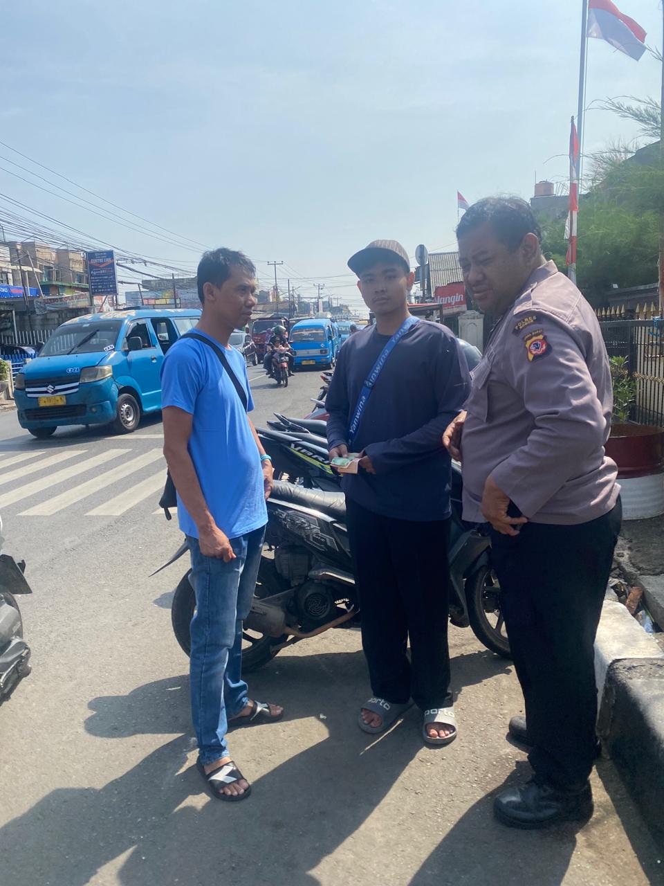 Ipda Priyo Utomo dan Panit Reskrim Aiptu Cucu Rudy Sikat Oknum Parkir liar